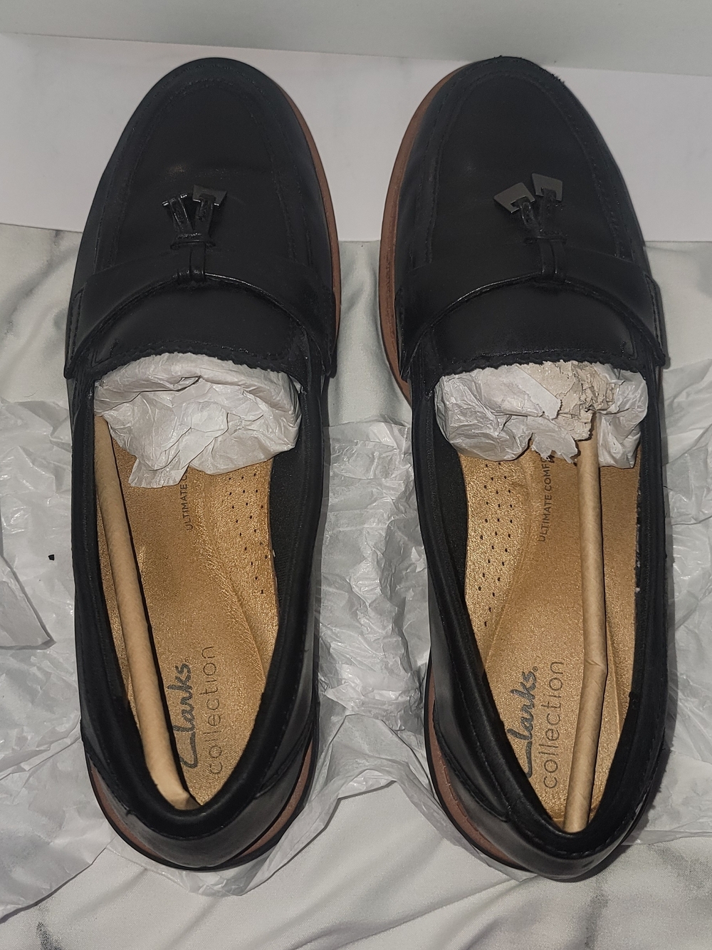 Clarks Men’s Black Leather Tassel Penny Loafers with Brown Sole